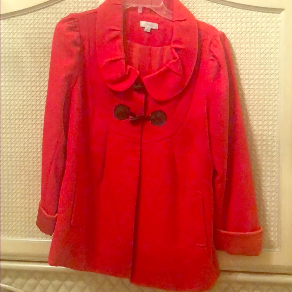 Red jacket with 2 black toggle close buttons